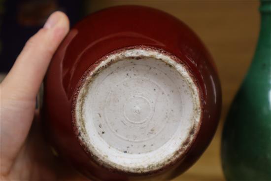 A Chinese sang de boeuf (langyao) vase and a Chinese green crackle glaze vase, 18th/19th century, Height 21cm